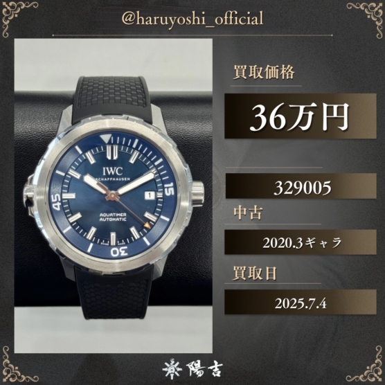 329005